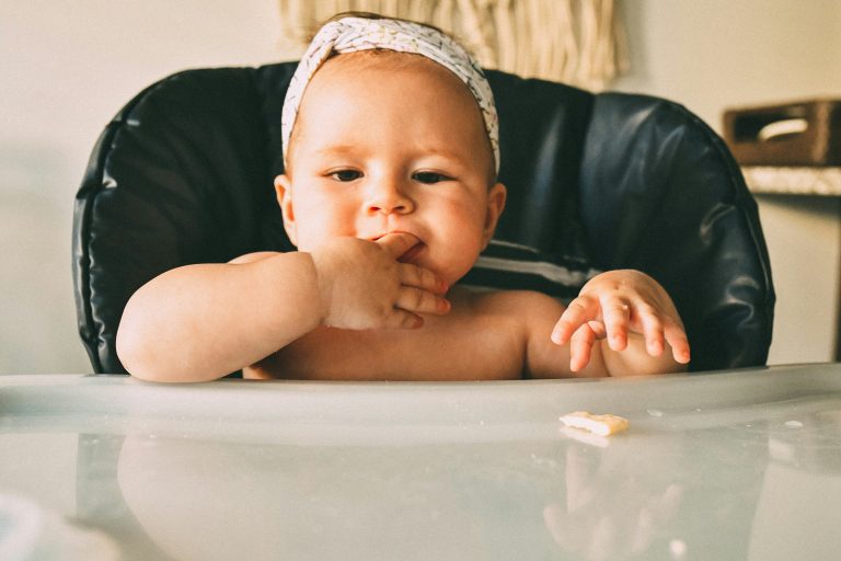 A baby self-feeding meat using Baby Led Weaning method