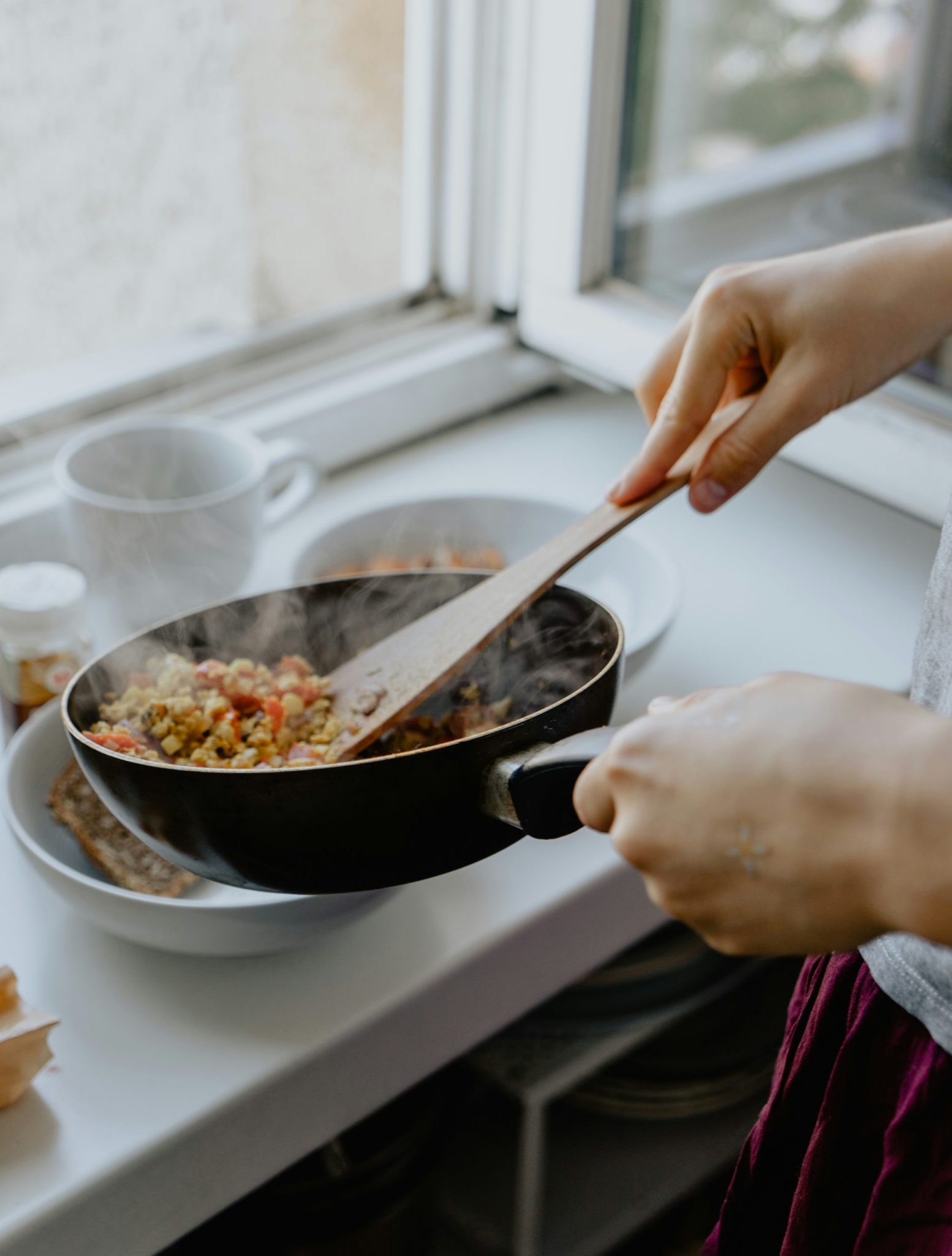 easy and affordable family dinner recipes being cooked in a frying pan