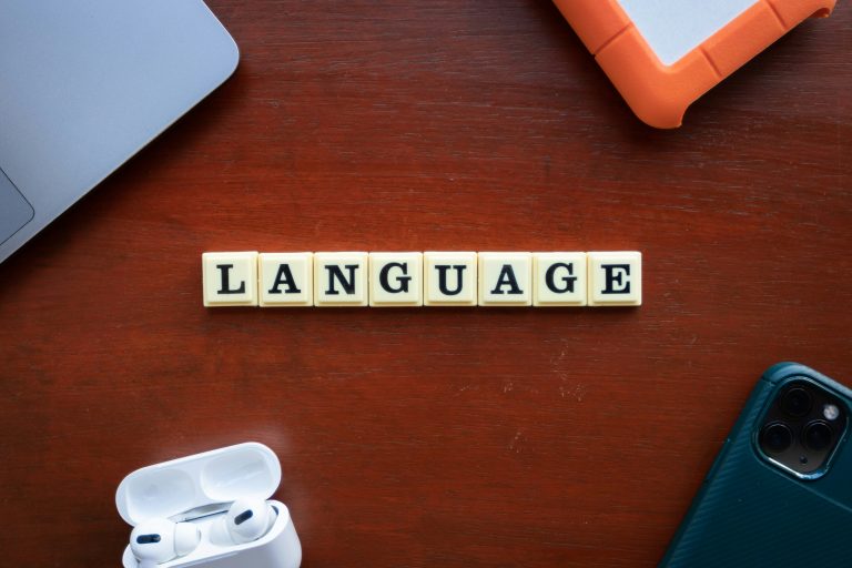 raising multilingual kids language scrabble tiles and tech accessories